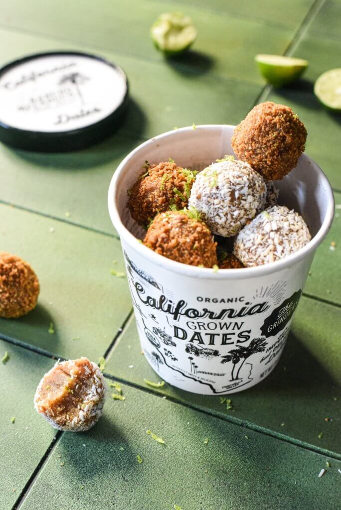 A cup with date balls inside